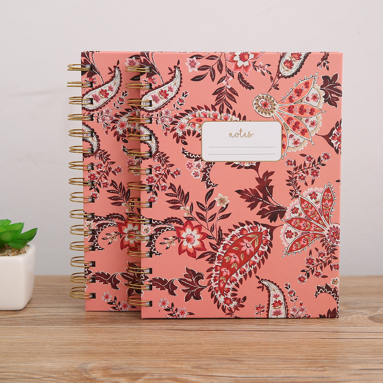 Hardcover spiral notebook with printed paper cover
